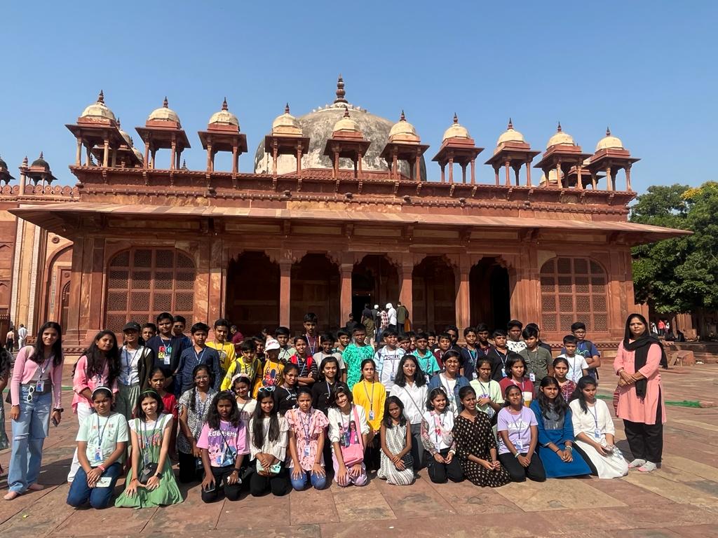 School students enjoying educational tour arranged by SRS Tours and Travels Bangalore