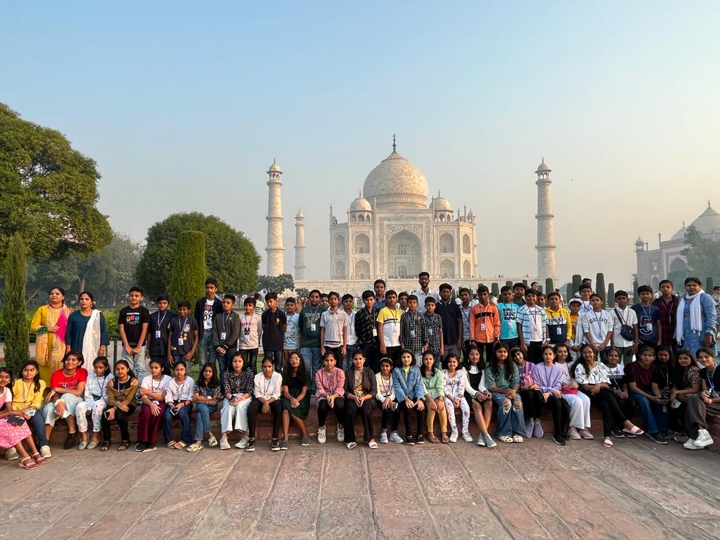 School students enjoying educational tour arranged by SRS Tours and Travels Bangalore