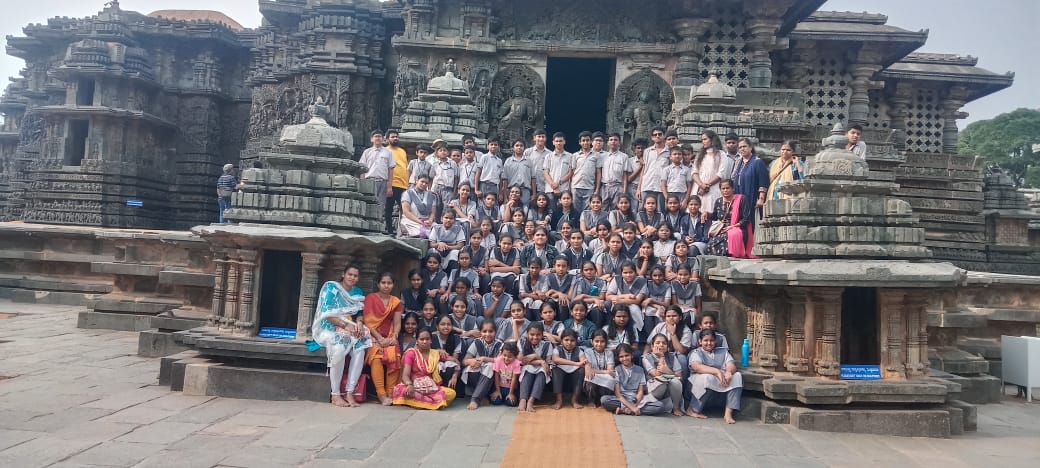School students enjoying educational tour arranged by SRS Tours and Travels Bangalore